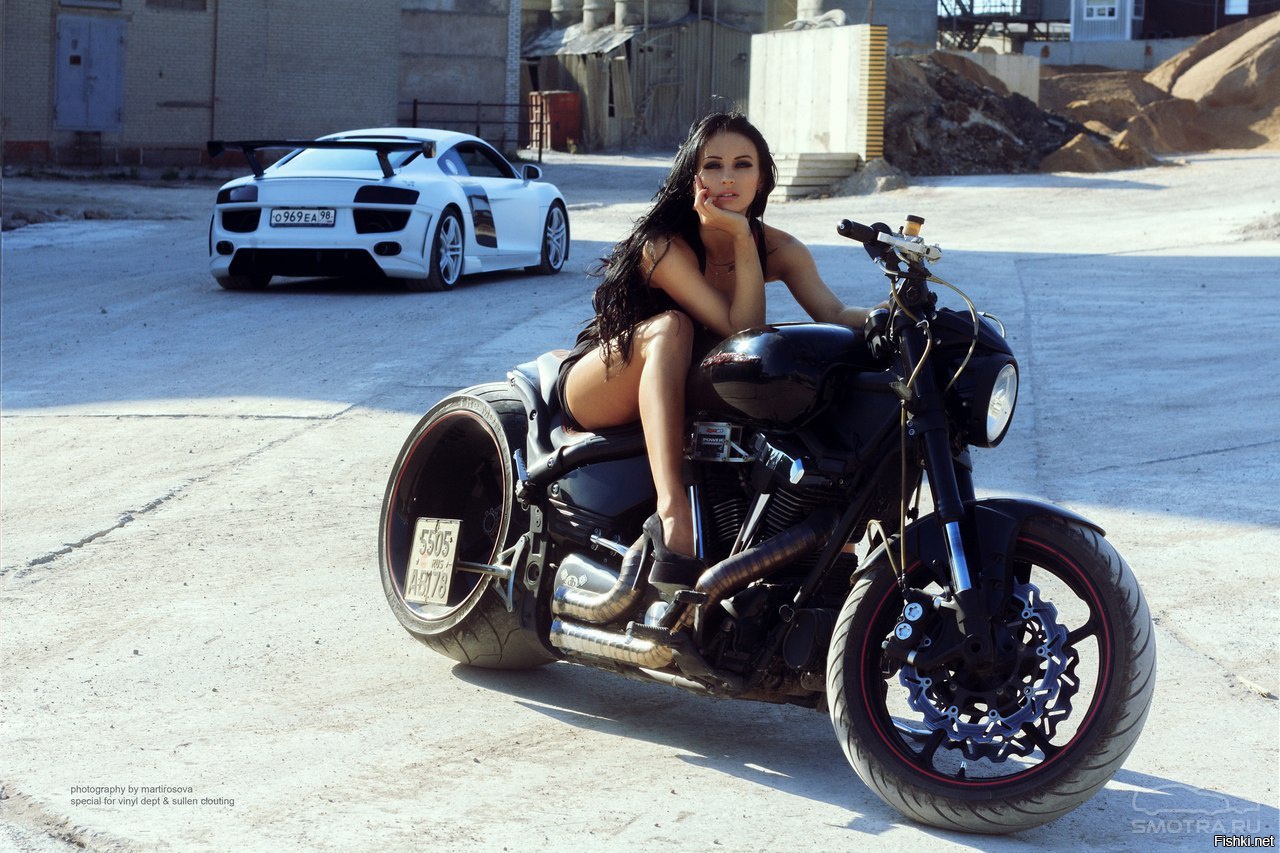 Sexy model Brunettes on a motorcycle in Aden